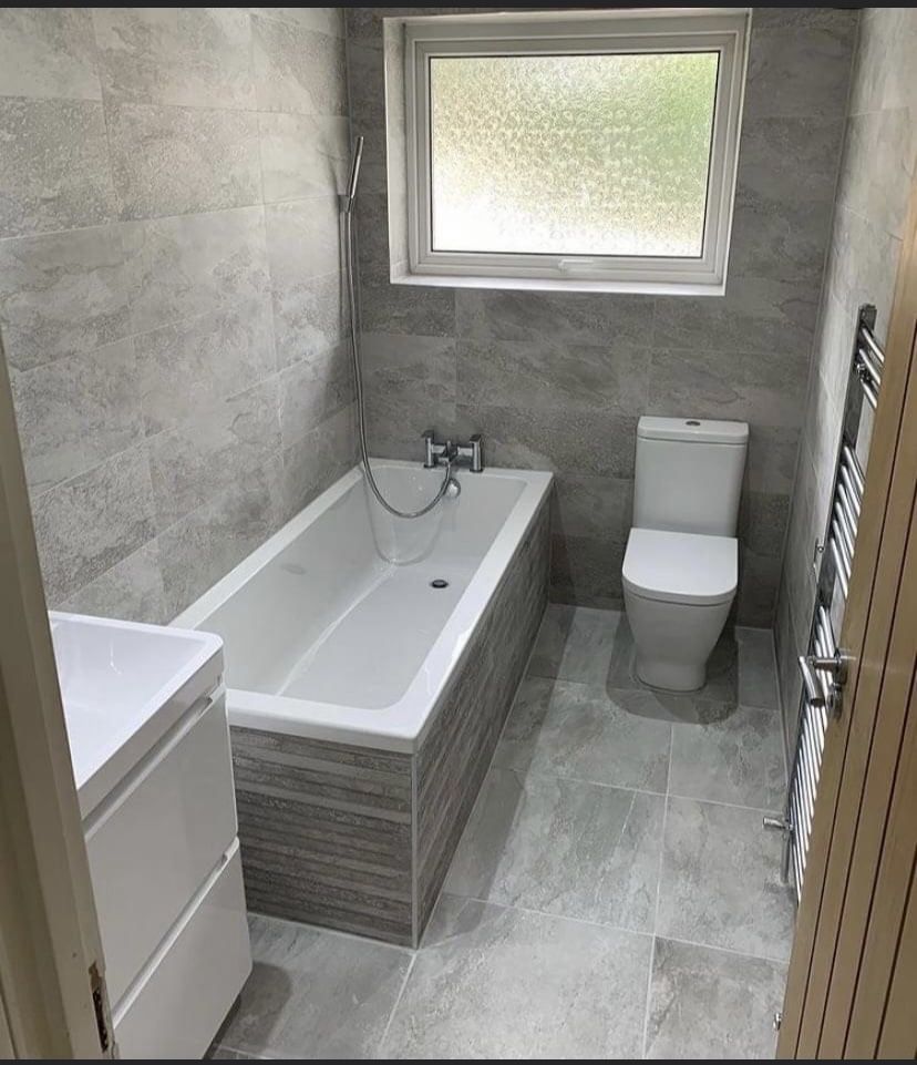 Affordable bathroom remodel with fresh flooring and fixtures
